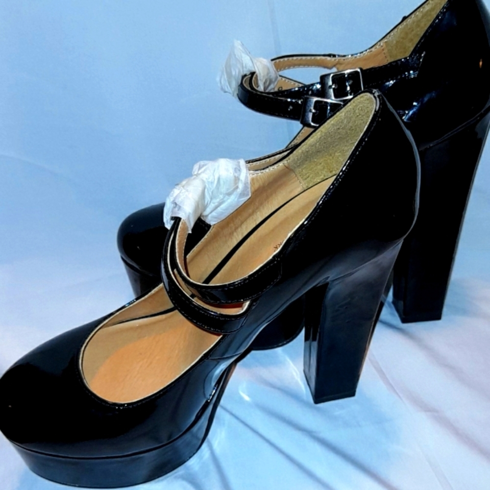GiziNY classic black shiny shoes ..